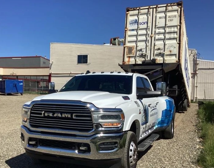 ironbox delivery truck offloading container