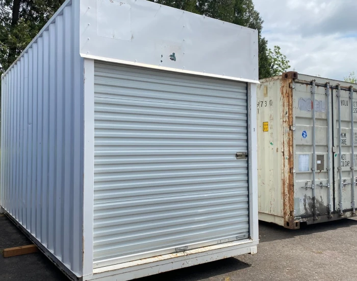 modified shipping container with roll-up door