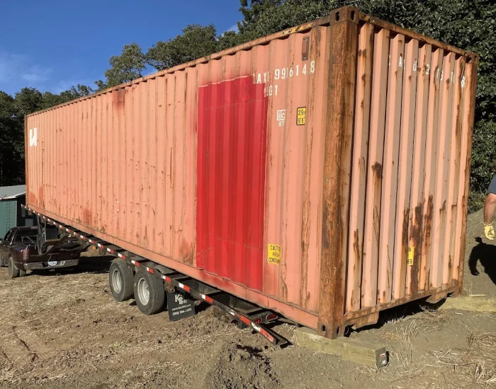 tilt-bed ground drop-off